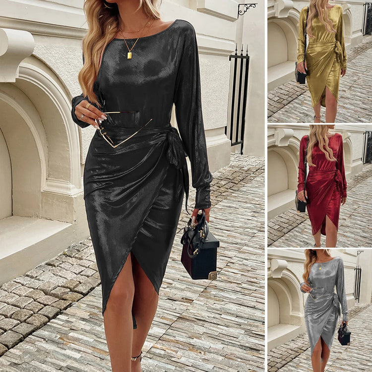 Woman wearing shiny long sleeve wrap dress with side tie in black, gold, red, and silver options