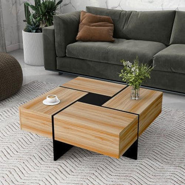 Modern living room with a green velvet sofa and square wood coffee table on patterned rug