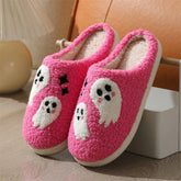 Pink fuzzy slippers with white ghost embroidery, cozy sherpa indoor footwear, closed toe