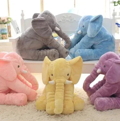 Plush elephant toys in gray, blue, yellow, pink, and purple with soft, velvety fabric