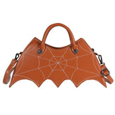 Brown faux leather handbag with spider web stitching, bat wing shape, detachable strap, streetwear style.