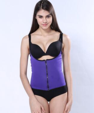 Woman wearing purple zip-up shapewear vest, black bra, and black briefs, slim fit