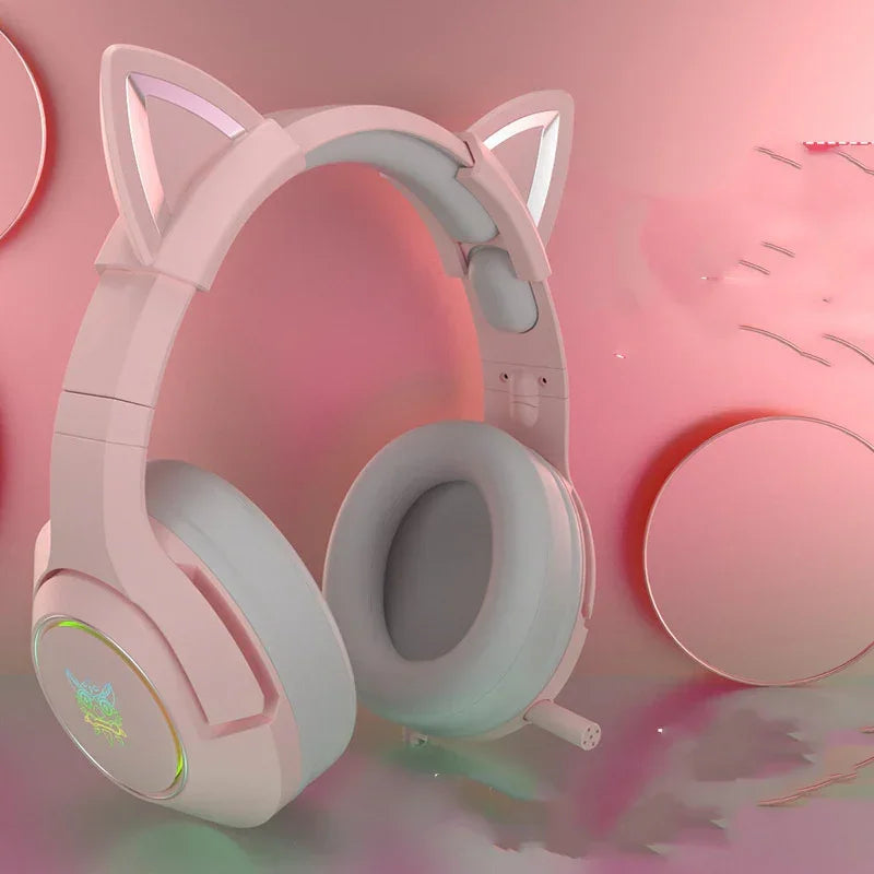 Pink over-ear headphones with soft padding and cat ear accents, modern tech accessory style