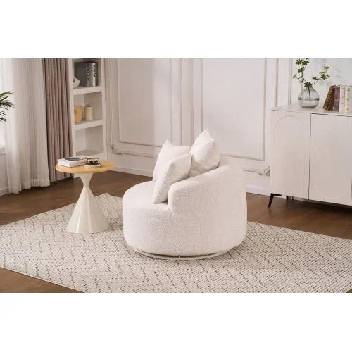 Modern white boucle round swivel chair with plush cushions in a minimalist living room