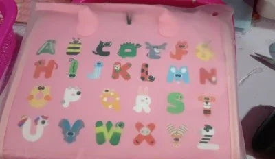 Pink accessory with colorful, cartoon animal alphabet print, soft material, playful design.