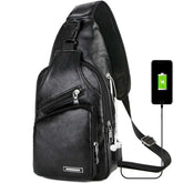 Black USB portable charging chest bag made of soft PU leather with multiple zippered pockets and headphone jack design