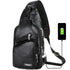 Black USB portable charging chest bag made of soft PU leather with multiple zippered pockets and headphone jack design