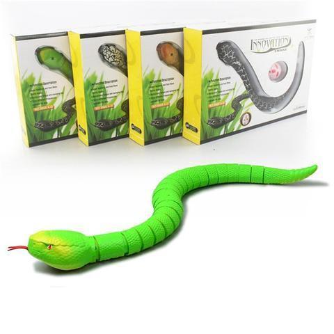 Realistic green snake toy with textured scales and movable body, displayed with packaging boxes.