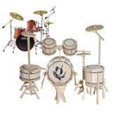 Wooden drum set model kit with detailed components, next to a full-size acoustic drum kit.