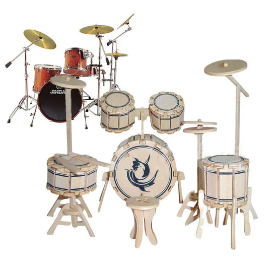 Wooden drum set model kit with detailed components, next to a full-size acoustic drum kit.