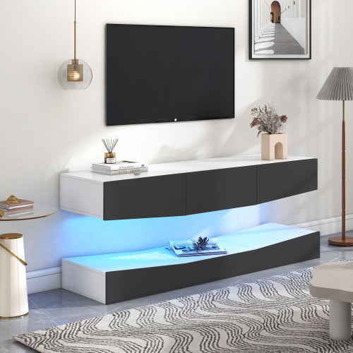 Grey particleboard hanging TV stand with LED lighting and storage compartments under wall-mounted flat-screen TV in modern living room