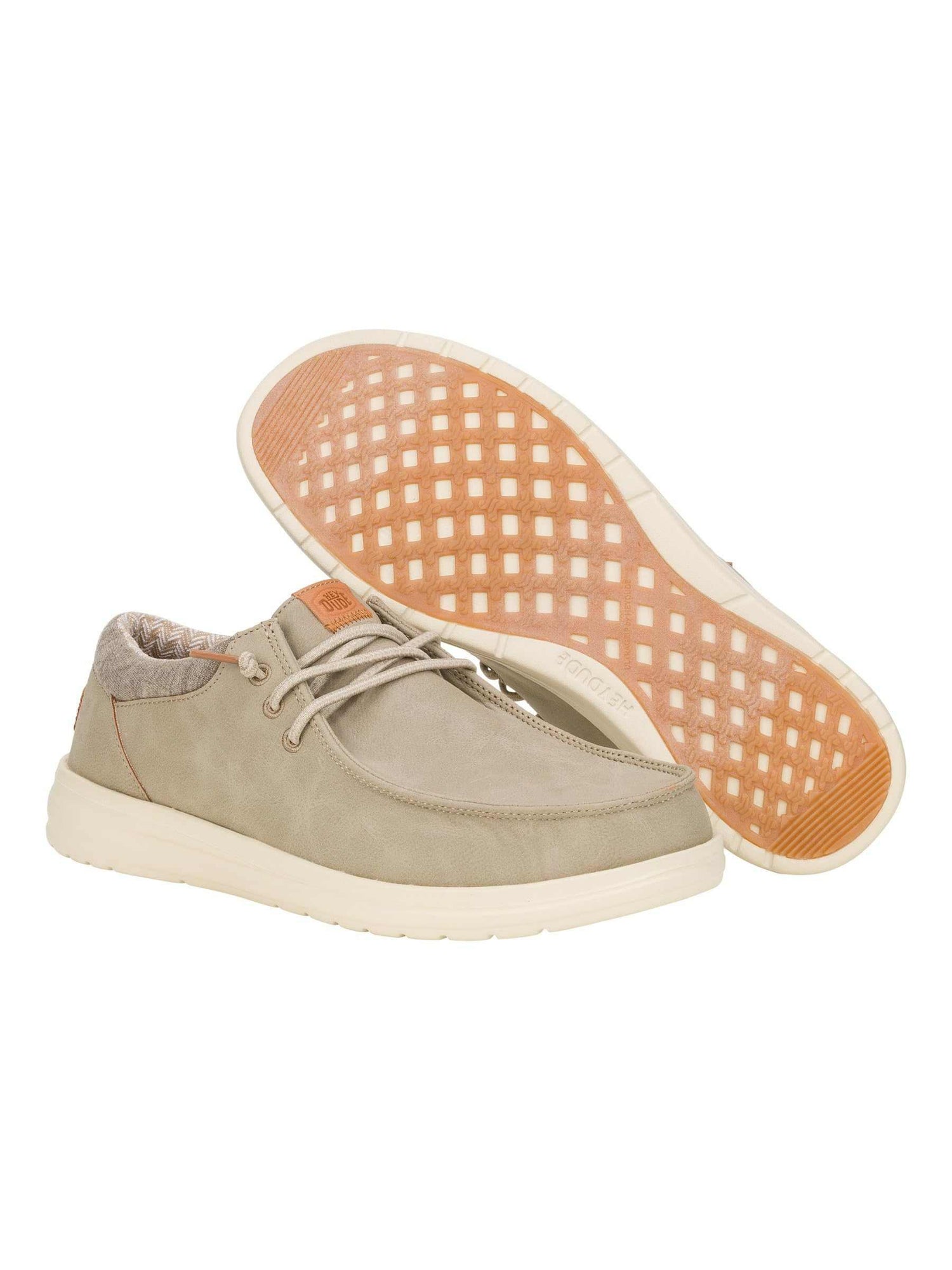 Beige suede casual lace-up sneakers with white cushioned soles and textured rubber outsole
