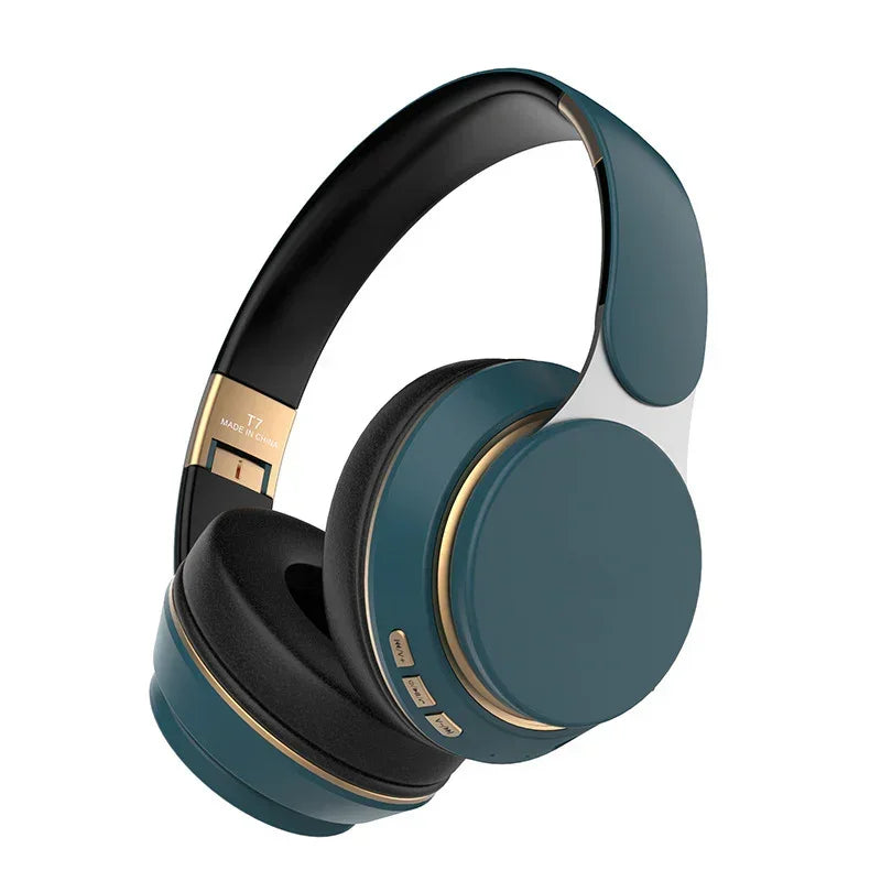 Matte teal over-ear headphones with gold accents and cushioned black ear pads