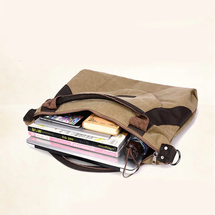 Khaki canvas messenger bag with brown accents, spacious fit holding books and tech accessories