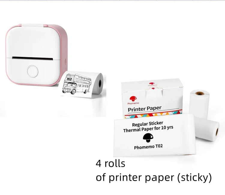 Compact pink and white thermal label printer with four rolls of sticky thermal printer paper.
