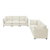 Cream-colored modular sofas with square cushions, soft fabric, and relaxed fit design