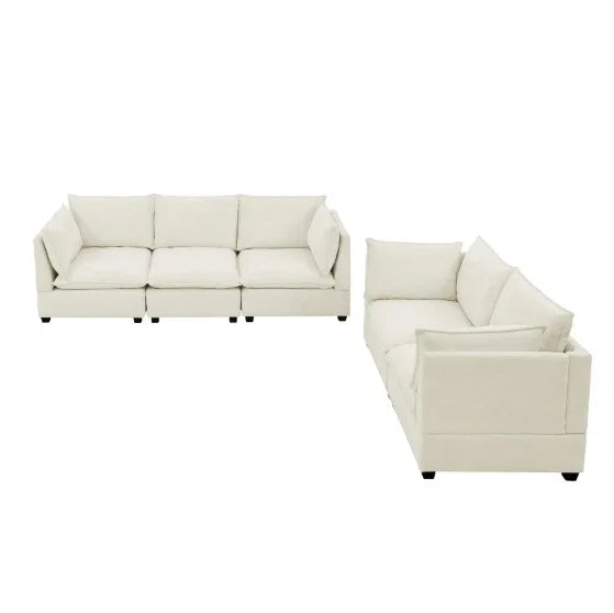 Cream-colored modular sofas with square cushions, soft fabric, and relaxed fit design