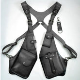 Black leather harness vest with adjustable straps and multiple utility pockets, modern streetwear style