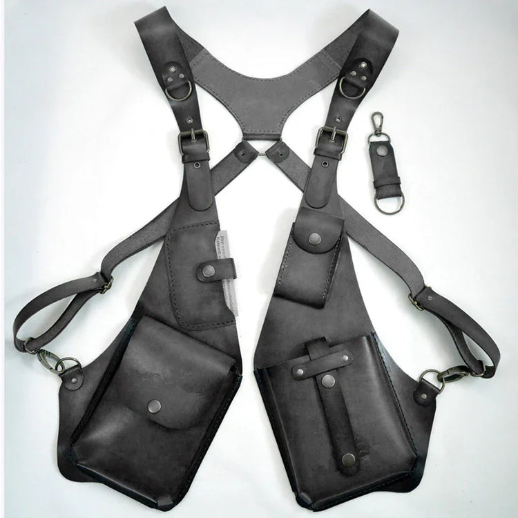 Black leather harness vest with adjustable straps and multiple utility pockets, modern streetwear style