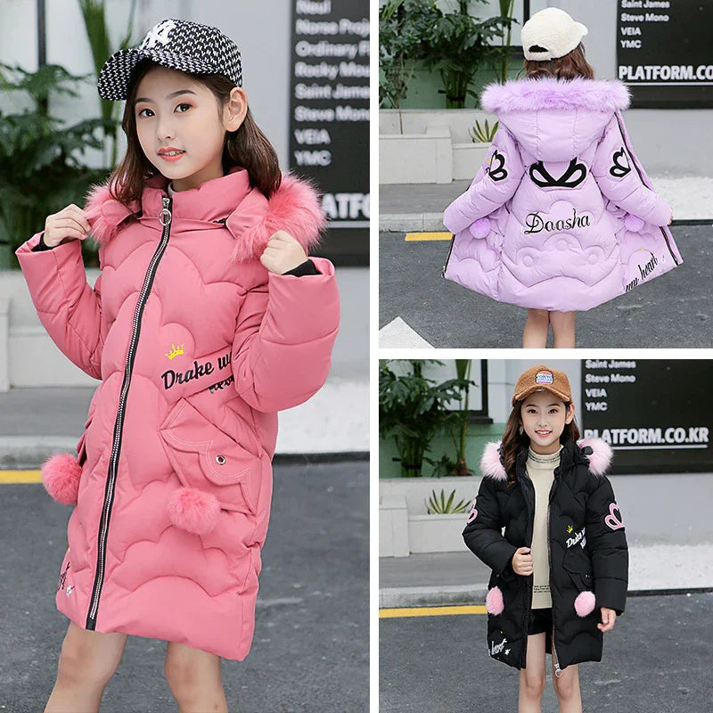 Girls wearing long puffer coats in pink, lavender, and black with faux fur trim and heart accents