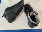 Black high-top sneakers with faux fur lining, leather material, chunky sole, streetwear style