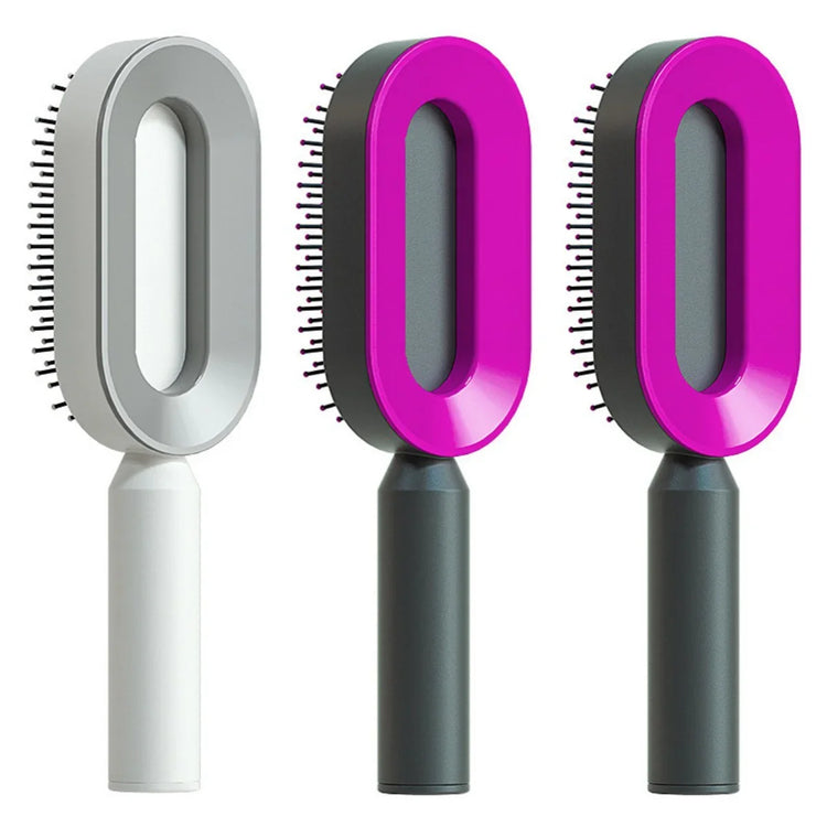 Modern oval hair brushes with ergonomic handles in gray and vibrant pink colors