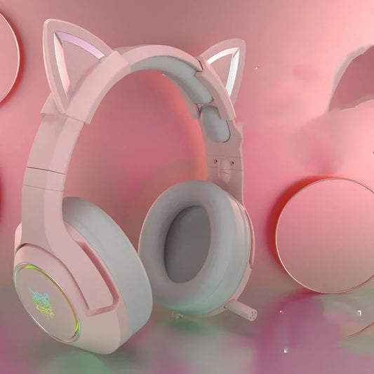 Pink over-ear headphones with soft ear cushions and cat ear accents, matte finish