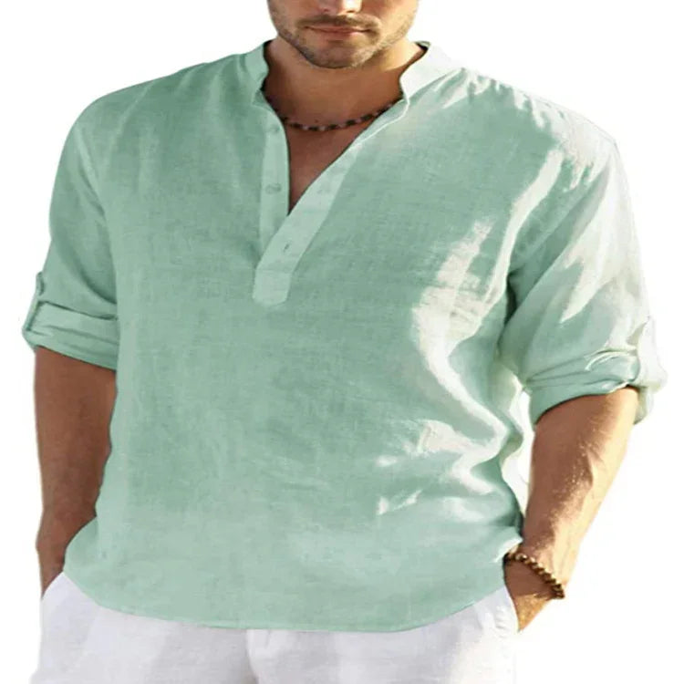 Men’s light green linen shirt with rolled sleeves and relaxed fit, casual summer style