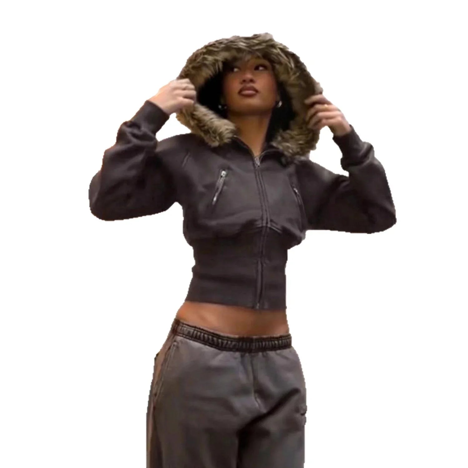 Woman wearing cropped dark brown zip-up hoodie with faux fur hood and matching jogger pants