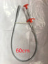Flexible 60cm metal grabber tool with orange handle for cleaning and retrieval tasks