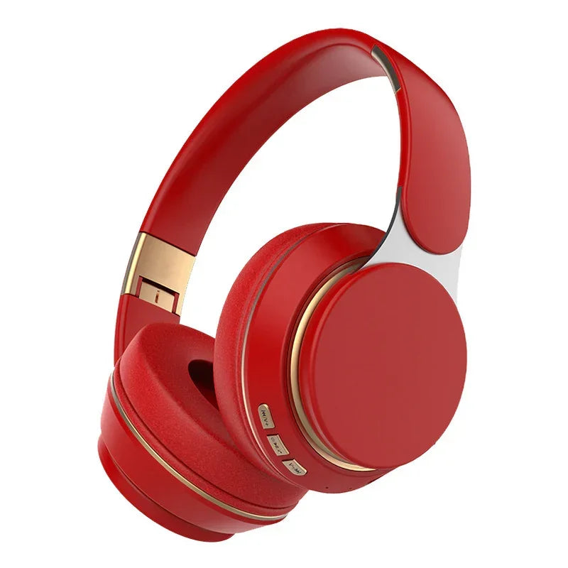 Red over-ear wireless headphones with cushioned ear pads and gold accents