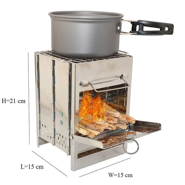 Stainless steel portable wood-burning camping stove with pot on top and visible fire inside.