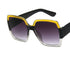 Square oversized sunglasses with black arms, yellow and silver glitter frame, gradient lenses.