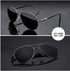 Aviator sunglasses with gunmetal frame and gray lenses, sleek modern streetwear style.