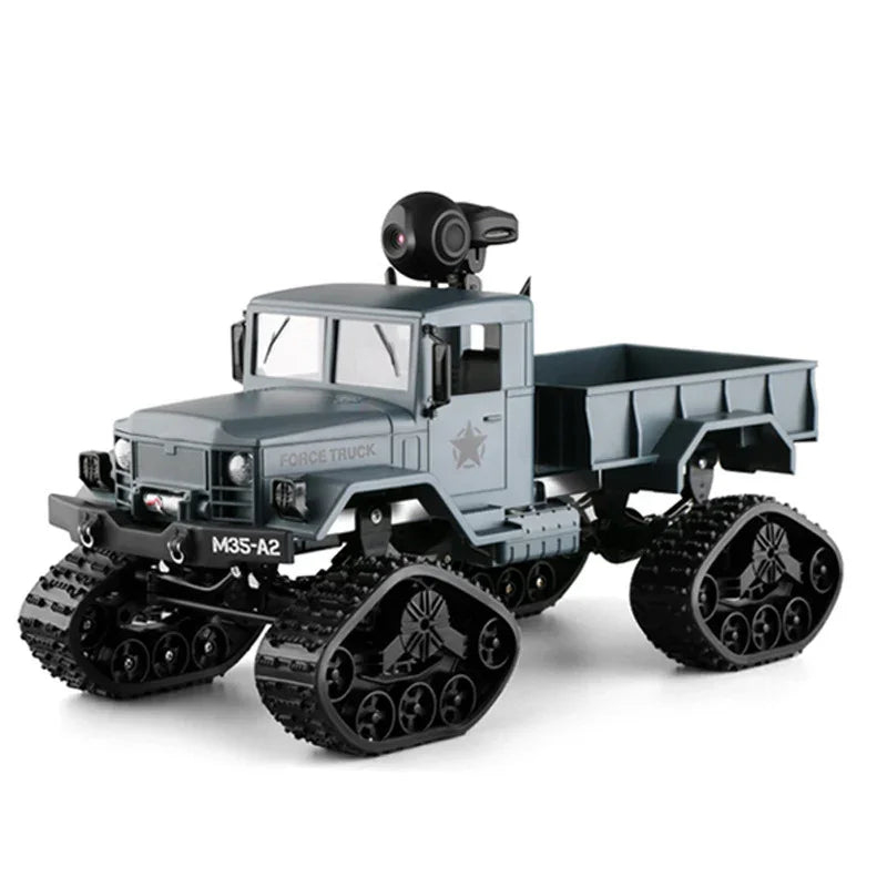 Gray military-style toy truck with black caterpillar tracks and cargo bed