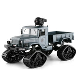 Gray military-style toy truck with black caterpillar tracks and cargo bed