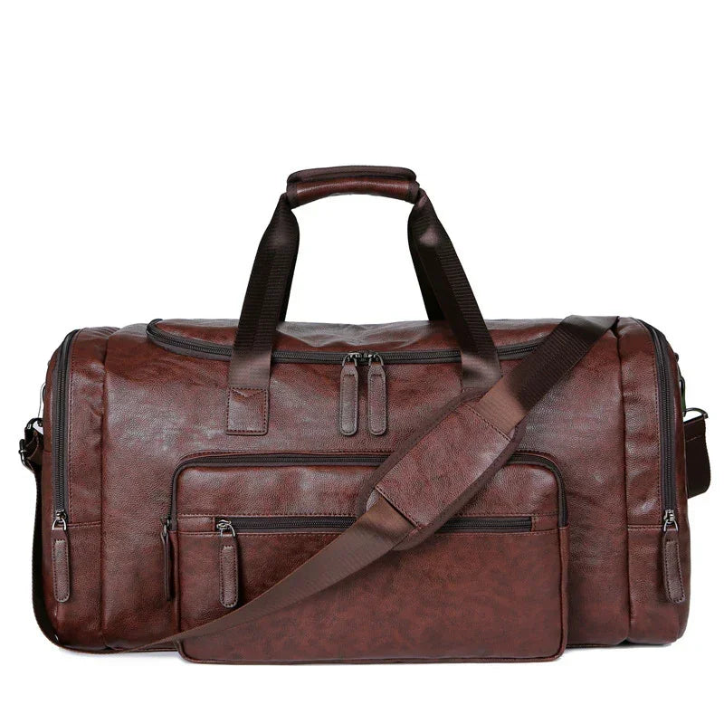 Brown faux leather duffel bag with multiple zippered pockets and adjustable shoulder strap