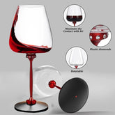 Red stem wine glass with plastic diamond accents, rotatable base, modern design, glass material.