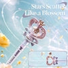 Pink and gold decorative wand with swirling water droplets, floral accents, and star-shaped attachments for creative play