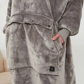 Cozy oversized gray fleece hoodie with large front pocket and relaxed fit streetwear style