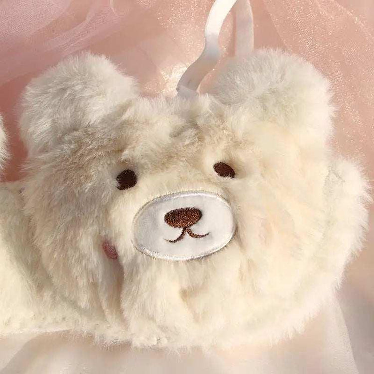Plush bear face mask in soft beige faux fur with embroidered details and adjustable fit