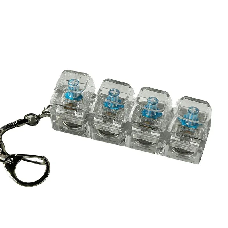Clear acrylic mechanical keychain with four blue switch keys, modern tech accessory