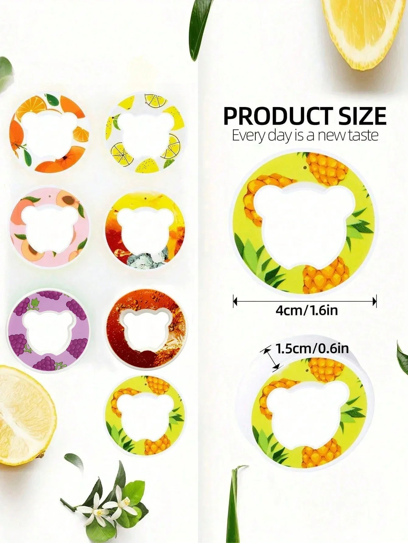 Assorted round fruit-themed plastic rings with bear-shaped cutouts, colorful design, small size.