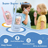 Boy in light blue t-shirt and girl in yellow t-shirt using pastel-colored walkie talkies outdoors