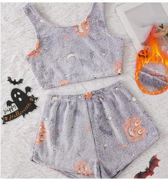 Soft purple fleece crop top and shorts lounge set with orange pumpkin print, relaxed fit