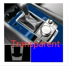 Transparent blue car gear shift panel cover with glossy finish, fits snug around controls