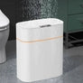 Modern waterproof white bathroom trash can with orange accent and rectangular design
