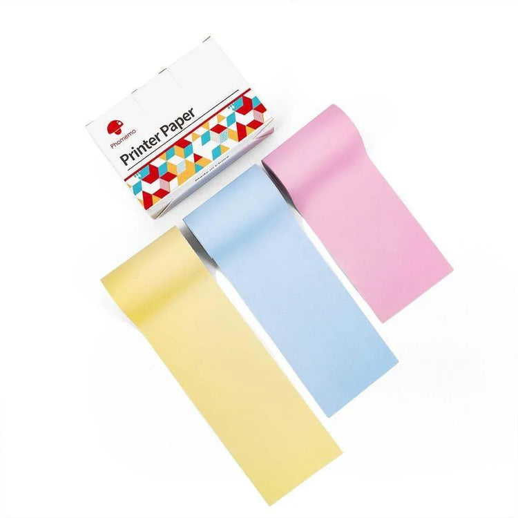 Three rolls of pastel printer paper in yellow, blue, and pink on a white background.
