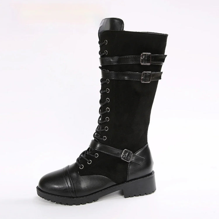 Black knee-high lace-up boot with buckle straps, chunky sole, and leather details