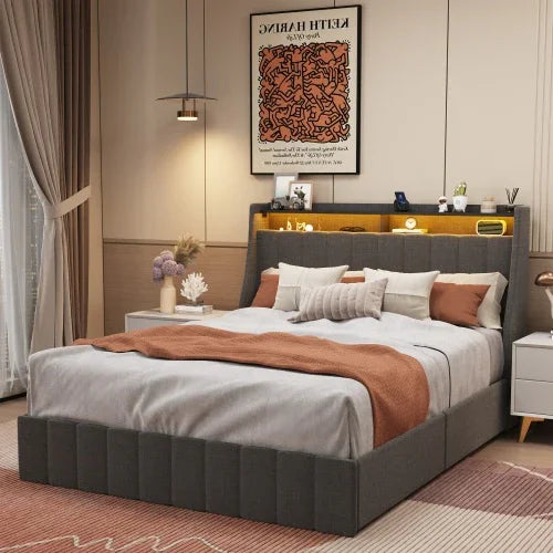 Modern bedroom with grey upholstered platform bed, white and rust bedding, soft fit